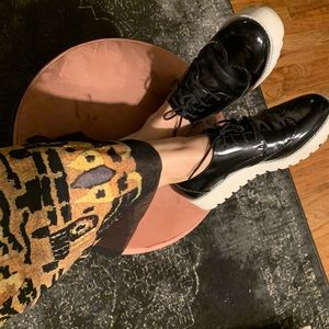 black wingtip platform sneakers